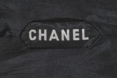 Lot 60 - A Gabrielle Chanel haute couture black wool and silk ensemble, circa 1969
