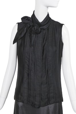 Lot 60 - A Gabrielle Chanel haute couture black wool and silk ensemble, circa 1969