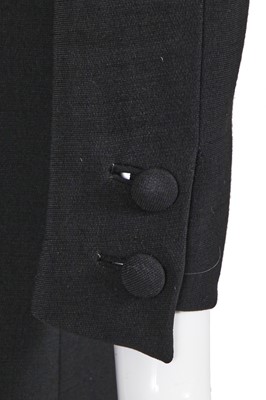 Lot 60 - A Gabrielle Chanel haute couture black wool and silk ensemble, circa 1969