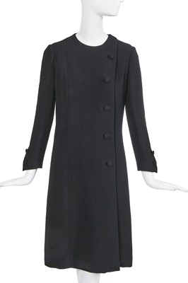 Lot 60 - A Gabrielle Chanel haute couture black wool and silk ensemble, circa 1969