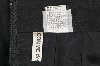 Lot 436 - A Comme des Garçons black wool skirt, Autumn-Winter 1990-91