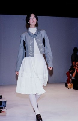 Lot 437 - A Comme des Garçons grey houndstooth wool jacket, 'Liberation from Tailoring' collection, Autumn-Winter 1989-1990