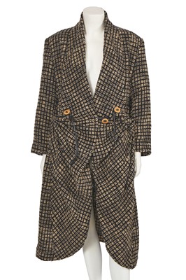 Lot 440 - An Issey Miyake black and cream check wool coat, Autumn-Winter 1986-87