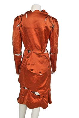 Lot 342 - A Vivienne Westwood copper-tone satin coat-dress, 'Wake Up, Cave Girl' collection, Autumn-Winter 2007-08