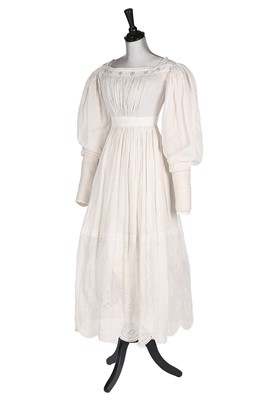 Lot 403 - A broderie Anglaise muslin dress, circa 1830,...