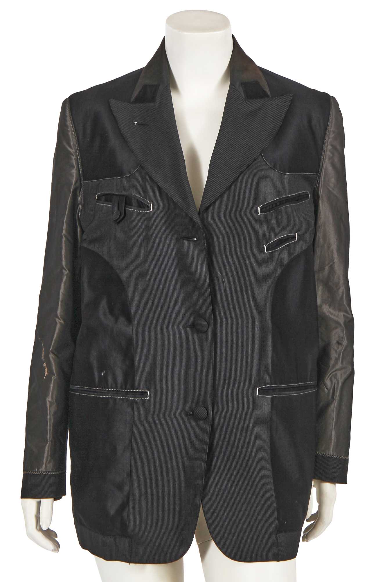Lot 567 - A Jean Paul Gaultier black and grey jacket,