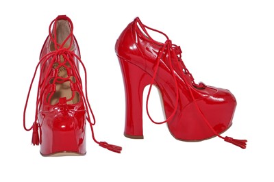 Lot 179 - A pair of Vivienne Westwood red patent leather elevated ghillie heels, 2000s