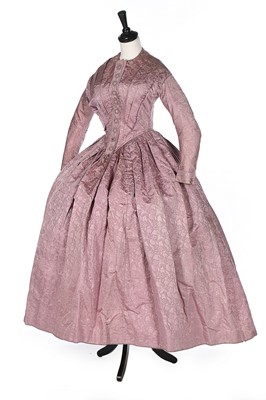 Lot 413 - A mauve damask silk day dress, mid 1840s, with...