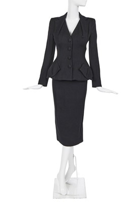 Lot 257 - A John Galliano black cloqué-silk suit, 'Dolores' collection, Autumn-Winter 1995-96