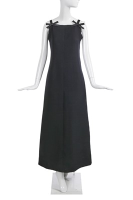 Lot 442 - An André Courrèges black crêpe maxi dress with bows, circa 1970