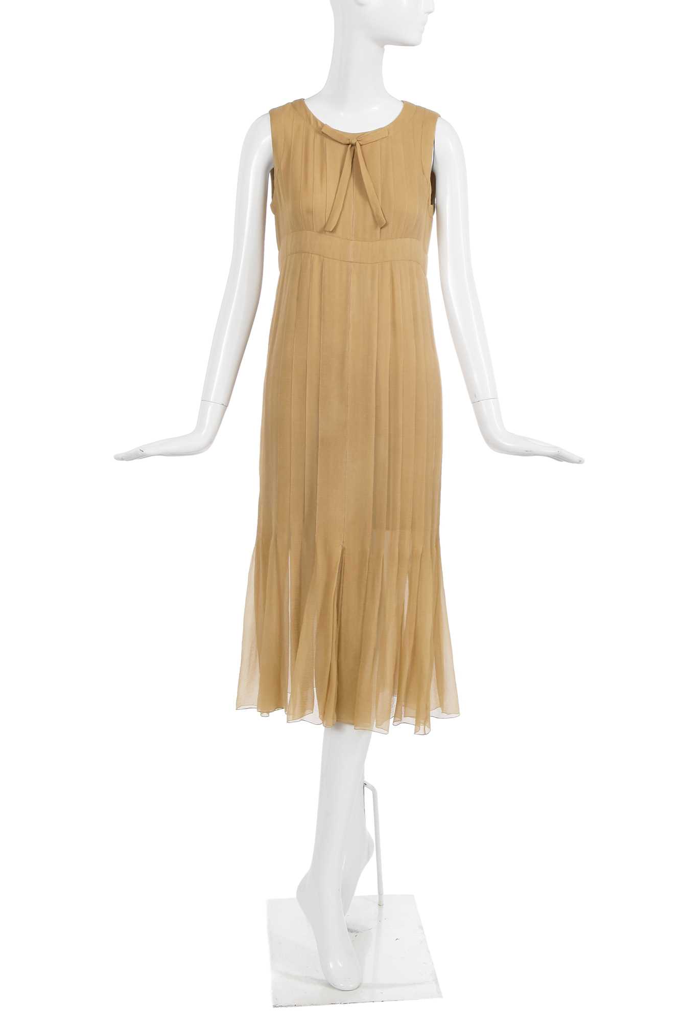 Lot 39 - A Chanel haute couture by Karl Lagerfeld buff silk chiffon dress, Spring-Summer 1993