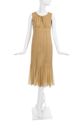 Lot 39 - A Chanel haute couture by Karl Lagerfeld buff silk chiffon dress, Spring-Summer 1993