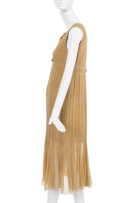 Lot 39 - A Chanel haute couture by Karl Lagerfeld buff silk chiffon dress, Spring-Summer 1993