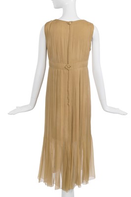Lot 39 - A Chanel haute couture by Karl Lagerfeld buff silk chiffon dress, Spring-Summer 1993