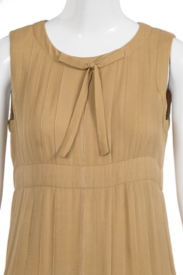 Lot 39 - A Chanel haute couture by Karl Lagerfeld buff silk chiffon dress, Spring-Summer 1993