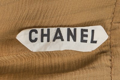 Lot 39 - A Chanel haute couture by Karl Lagerfeld buff silk chiffon dress, Spring-Summer 1993