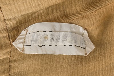 Lot 39 - A Chanel haute couture by Karl Lagerfeld buff silk chiffon dress, Spring-Summer 1993