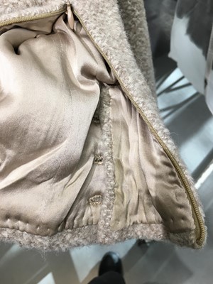 Lot 26 - A Chanel haute couture by Karl Lagerfeld oatmeal bouclé wool coat, Autumn-Winter 2002-03