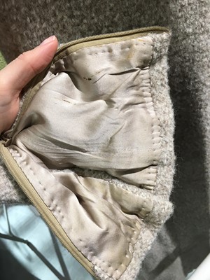 Lot 26 - A Chanel haute couture by Karl Lagerfeld oatmeal bouclé wool coat, Autumn-Winter 2002-03