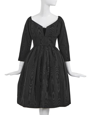 Lot 499 - A Christian Dior black silk moiré faille cocktail dress, circa 1952