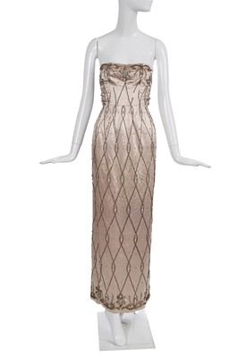 Lot 507 - A Maggy Rouff haute couture embellished cream evening gown, mid-1950s