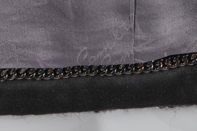 Lot 8 - A Chanel by Karl Lagerfeld grey tweed jacket, 'Chanel Airspace' collection, Autumn-Winter 2017-18