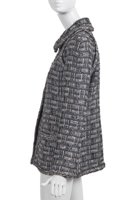 Lot 8 - A Chanel by Karl Lagerfeld grey tweed jacket, 'Chanel Airspace' collection, Autumn-Winter 2017-18