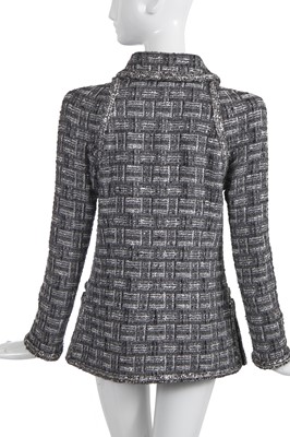 Lot 8 - A Chanel by Karl Lagerfeld grey tweed jacket, 'Chanel Airspace' collection, Autumn-Winter 2017-18