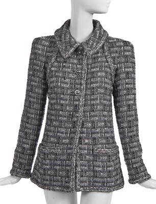 Lot 8 - A Chanel by Karl Lagerfeld grey tweed jacket, 'Chanel Airspace' collection, Autumn-Winter 2017-18