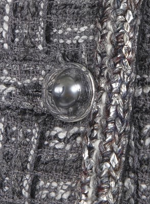 Lot 8 - A Chanel by Karl Lagerfeld grey tweed jacket, 'Chanel Airspace' collection, Autumn-Winter 2017-18