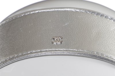 Lot 6 - A Chanel by Karl Lagerfeld pastel tweed jacket and pink cape, 'Chanel Airspace' collection, Autumn-Winter 2017-18