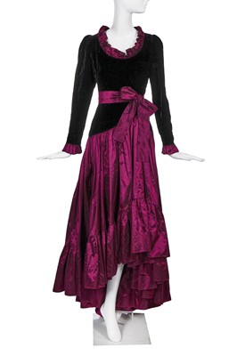 Lot 390 - An Yves Saint Laurent black velvet and purple taffeta evening gown, circa 1980