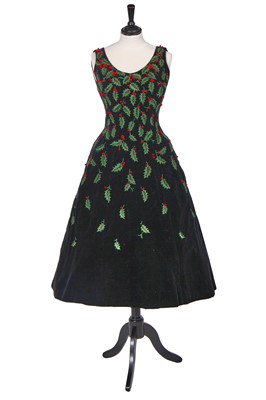 Lot 502 - A Pierre Balmain haute couture black velvet 'Holly' dress, 1955