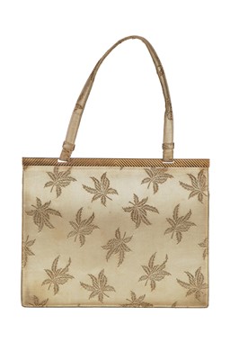 Lot 95 - A Cartier London gold silk brocade handbag, 1962