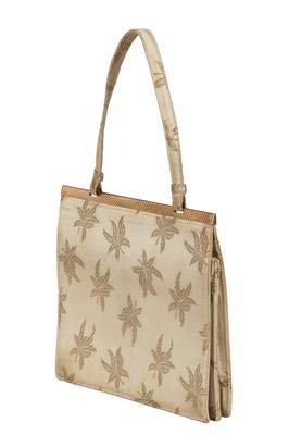 Lot 95 - A Cartier London gold silk brocade handbag, 1962