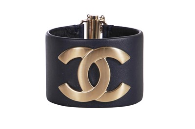 Lot 5 - A Chanel by Karl Lagerfeld navy blue leather cuff bracelet, ‘La Modernité de l’Antiquité’ collection, Cruise 2018