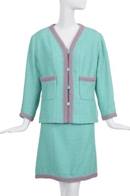 Lot 37 - A Chanel by Karl Lagerfeld turquoise cotton-wool blend bouclé suit, Spring-Summer 1994