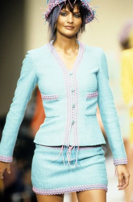 Lot 37 - A Chanel by Karl Lagerfeld turquoise cotton-wool blend bouclé suit, Spring-Summer 1994