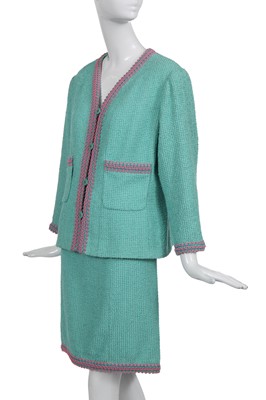 Lot 37 - A Chanel by Karl Lagerfeld turquoise cotton-wool blend bouclé suit, Spring-Summer 1994