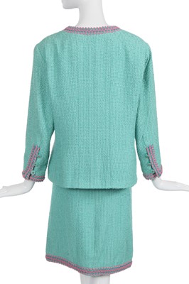 Lot 37 - A Chanel by Karl Lagerfeld turquoise cotton-wool blend bouclé suit, Spring-Summer 1994
