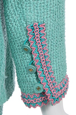 Lot 37 - A Chanel by Karl Lagerfeld turquoise cotton-wool blend bouclé suit, Spring-Summer 1994