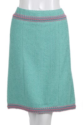 Lot 37 - A Chanel by Karl Lagerfeld turquoise cotton-wool blend bouclé suit, Spring-Summer 1994