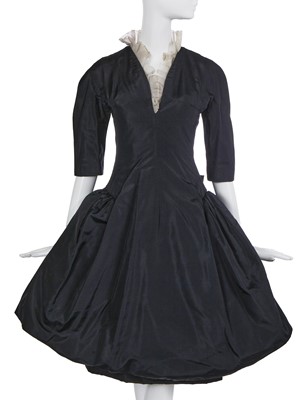Lot 489 - A Christian Dior London black silk faille cocktail dress, circa 1959