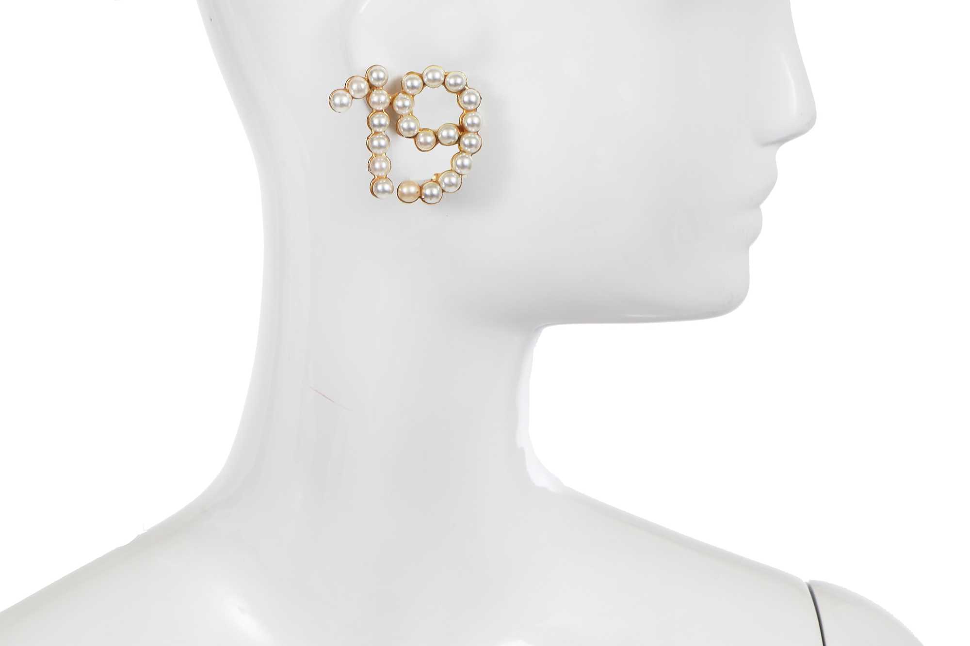 Lot 48 - A pair of Chanel gilt and faux pearl numerical earrings, Spring-Summer 1982
