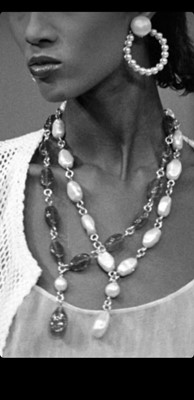 Lot 48 - A pair of Chanel gilt and faux pearl numerical earrings, Spring-Summer 1982