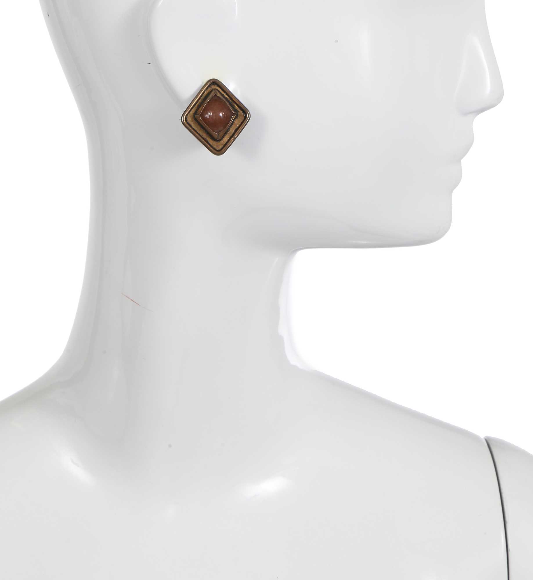 Lot 65 - A pair of Gabrielle Chanel haute couture brass and cabochon earrings, 1970s