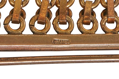 Lot 66 - A Gabrielle Chanel haute couture brass and rhinestone bracelet, 1970s