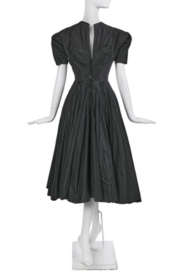 Lot 504 - A Madame Grès haute couture black paper taffeta cocktail dress, circa 1950