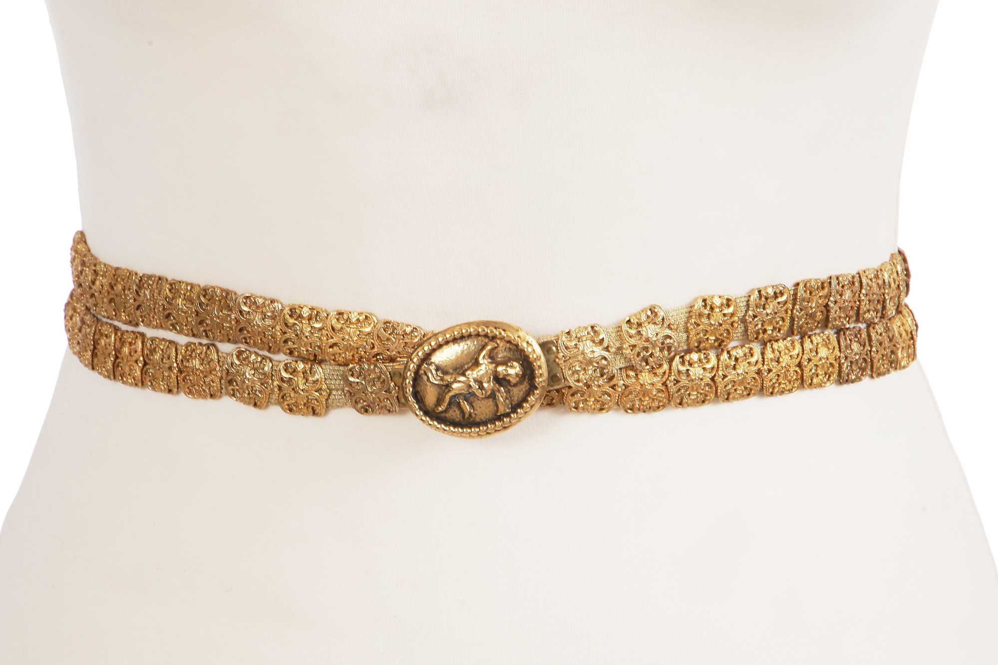 Lot 67 - A Gabrielle Chanel haute couture gilt filigree cherub belt, 1960s