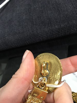 Lot 67 - A Gabrielle Chanel haute couture gilt filigree cherub belt, 1960s